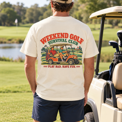 Weekend Golf Survival Club tee in Ivory, back print shown on a model in a golf-course lifestyle mockup
